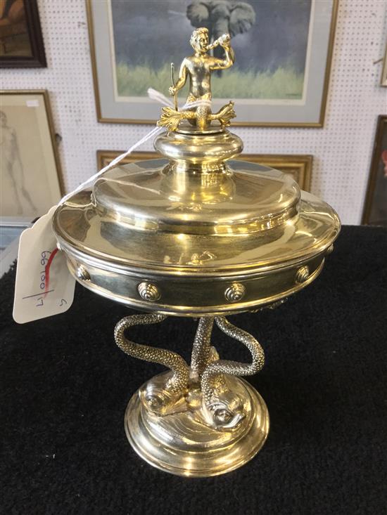 Lambert & Co silver gilt presentation cup and cover, tripartite dolphin support & Triton finial, inscribed to interior